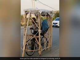 कड़ी धूप और बारिश से बचने के लिए बुजुर्ग ने भिड़ाया गजब का जुगाड़, देखें वीडियो कड़ी धूप और बारिश से बचने के लिए बुजुर्ग ने भिड़ाया गजब का जुगाड़, देखें वीडियो