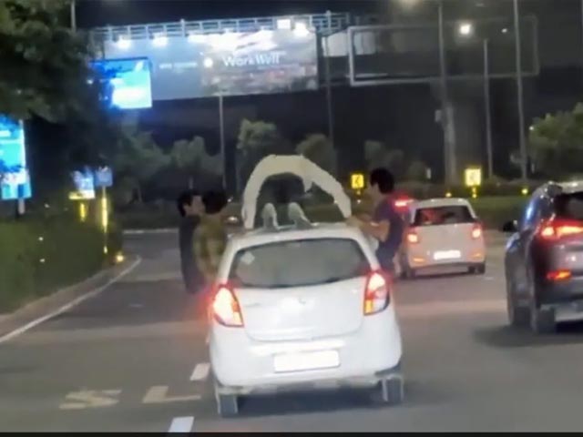 Video: Gurugram Man Seen Doing Push-Ups On Top Of Moving Car, Police File Case
