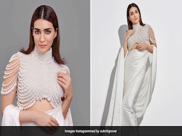 Kriti Sanon Drapes Herself In Pearl White Magnificence In A Dreamy <i>Saree</i> Kriti Sanon Drapes Herself In Pearl White Magnificence In A Dreamy <i>Saree</i>