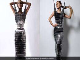 Natasha Poonawalla's Schiaparelli Dress With Pointed Ends Is An Ode To Karl's Cat Choupette Natasha Poonawalla's Schiaparelli Dress With Pointed Ends Is An Ode To Karl's Cat Choupette