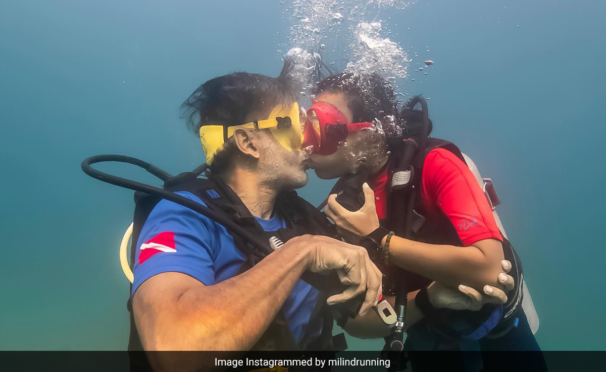 Milind Soman And Ankita Konwar Seal Maldives Album With An Underwater Kiss