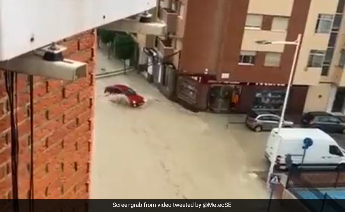 Terrifying Video Shows Car Sweeping Backwards By Fast-Flowing Floodwater In Spain