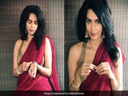 In A Red And Gold Number, Mallika Sherawat Confesses To Being A "<i>Saree</i> Girl", And A Chic One At That In A Red And Gold Number, Mallika Sherawat Confesses To Being A "<i>Saree</i> Girl", And A Chic One At That
