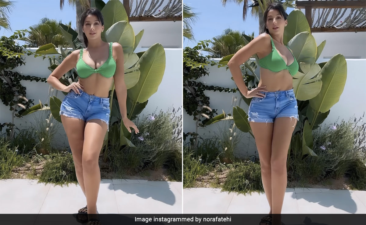 Nora Fatehi Breaks Into A Fiery Dance Again Wearing Her Signature Spunk And A Swim Top