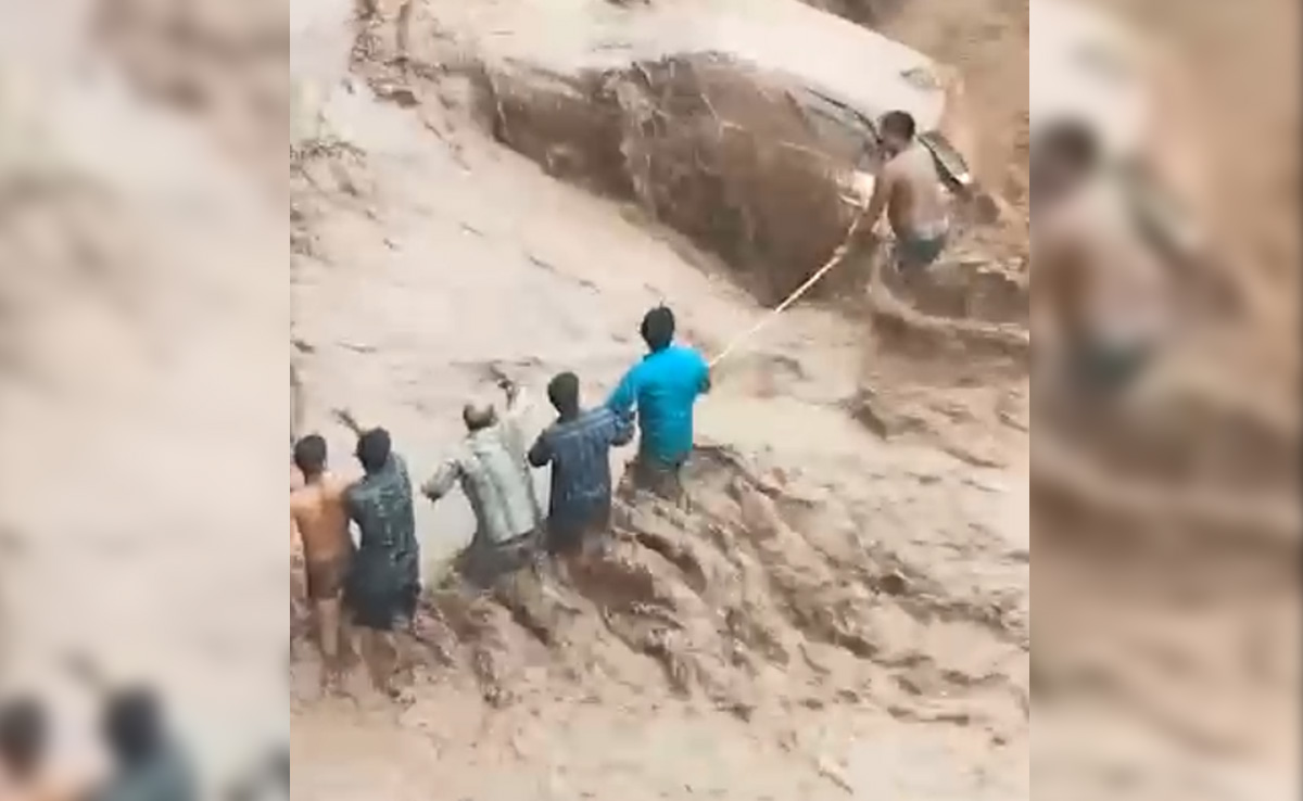 Video: Woman's Dramatic Rescue From A Submerged Car In Haryana