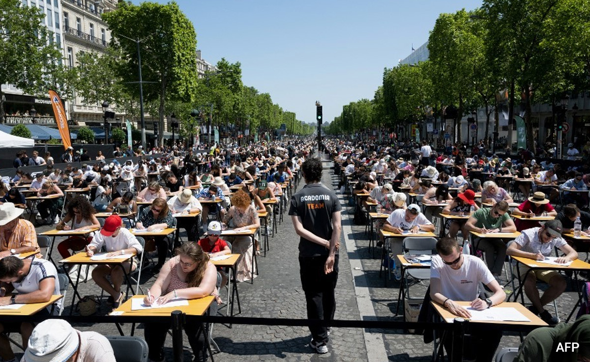 Spell It Out: Paris' Iconic Champs-Elysees Hosts Mass Dictation Event