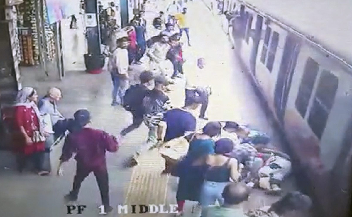 Watch: Alert Railway Official Saves Elderly Woman's Life Who Slipped While Boarding Train