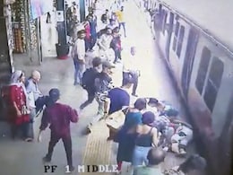 Watch: Alert Railway Official Saves Elderly Woman's Life Who Slipped While Boarding Train Watch: Alert Railway Official Saves Elderly Woman's Life Who Slipped While Boarding Train