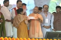 Yogi Adityanath Hands Over Flats Built On Killed Gangster's Seized Land Yogi Adityanath Hands Over Flats Built On Killed Gangster's Seized Land