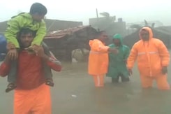 Cyclone Biparjoy: In Knee-Deep Water, Boy Rescued On Shoulders By NDRF Team Cyclone Biparjoy: In Knee-Deep Water, Boy Rescued On Shoulders By NDRF Team