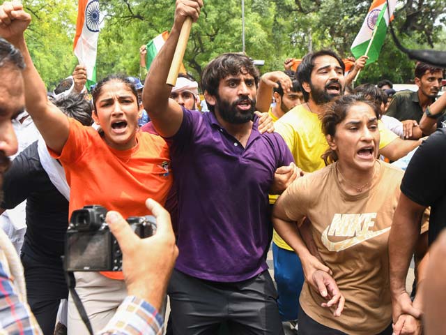 Wrestlers Rejoin Work, But 'Protest To Continue'