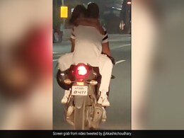 Video Shows Couple Romancing On A Moving Bike, Ghaziabad Police Responds Video Shows Couple Romancing On A Moving Bike, Ghaziabad Police Responds