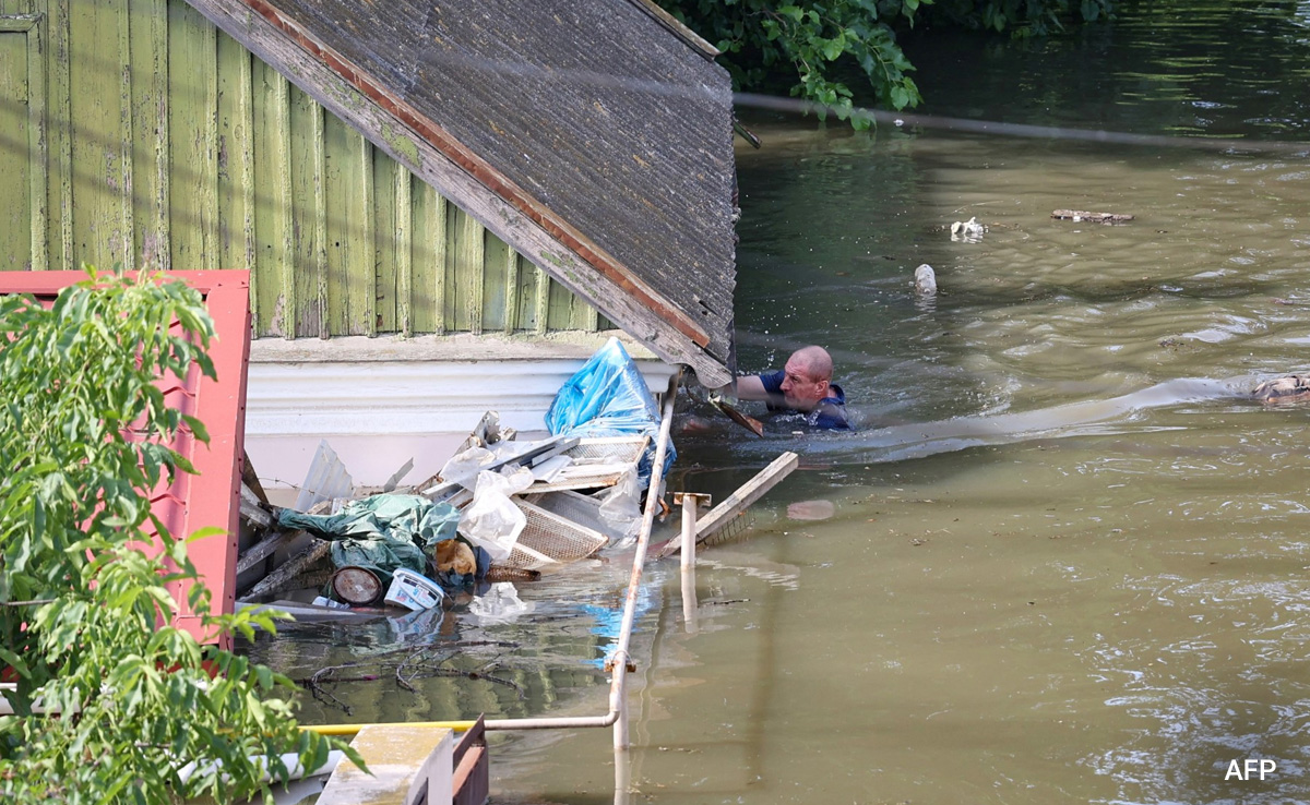"Can't Even See Roof": Ukrainians Escape Flooded Homes After Dam Collapse