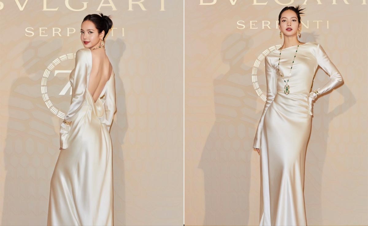 Lisa From <i>Blackpink</i>'s Sweeping White Gown Came With A Daring Plunging Backline