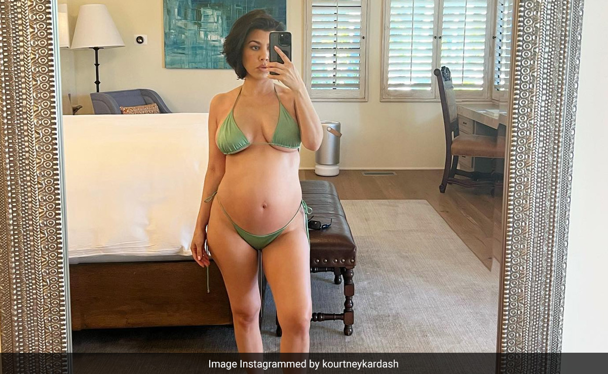 Pregnant Kourtney Kardashian's "Sweet Summer" Comes With A Green String Bikini And Her Baby Bump On Display