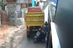 Video: Narrow Escape For Kerala Students After Scooter Stuck Between Bus And Lorry Video: Narrow Escape For Kerala Students After Scooter Stuck Between Bus And Lorry