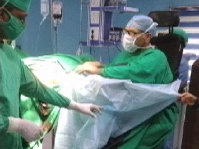Paralysed Waist Down, This Doctor Performs Operations From His Wheelchair