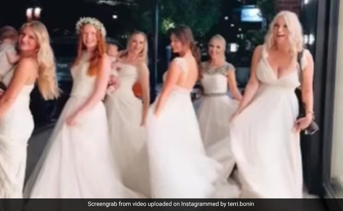 Mom and Her Six Daughters Go To Dinner Wearing Wedding Dresses, Pics Go Viral