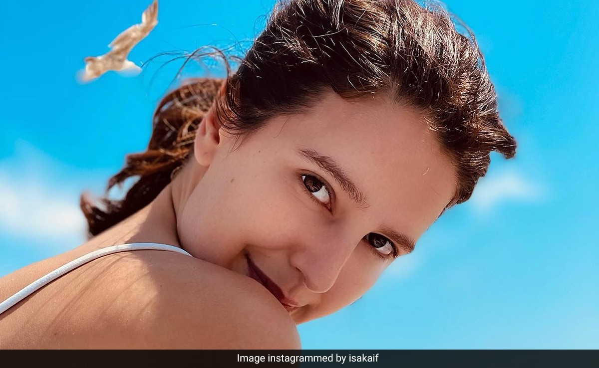 Though It Came With "A Side Of Work", We'd Be Up For A Beach Day Like Isabelle Kaif In A White Swimsuit