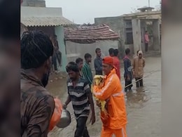 Watch: Cyclone Rescue Team Carries Infant In Empty Cement Bag In Gujarat Watch: Cyclone Rescue Team Carries Infant In Empty Cement Bag In Gujarat