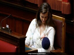 Italian Lawmaker Breastfeeds Baby In Parliament, 1st MP To Do So Italian Lawmaker Breastfeeds Baby In Parliament, 1st MP To Do So