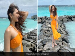 Rakul Preet Singh's Is The Most Stunning "Mermaid" In Maldives In An Orange Cutout Dress Rakul Preet Singh's Is The Most Stunning "Mermaid" In Maldives In An Orange Cutout Dress