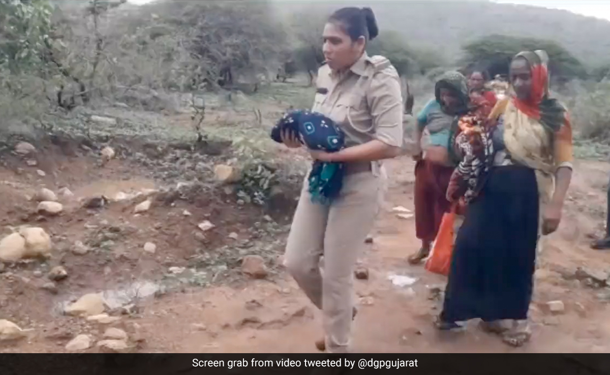 Video: Gujarat Woman Cop Carries 4-Day-Old Child To Safety As Biparjoy Hits