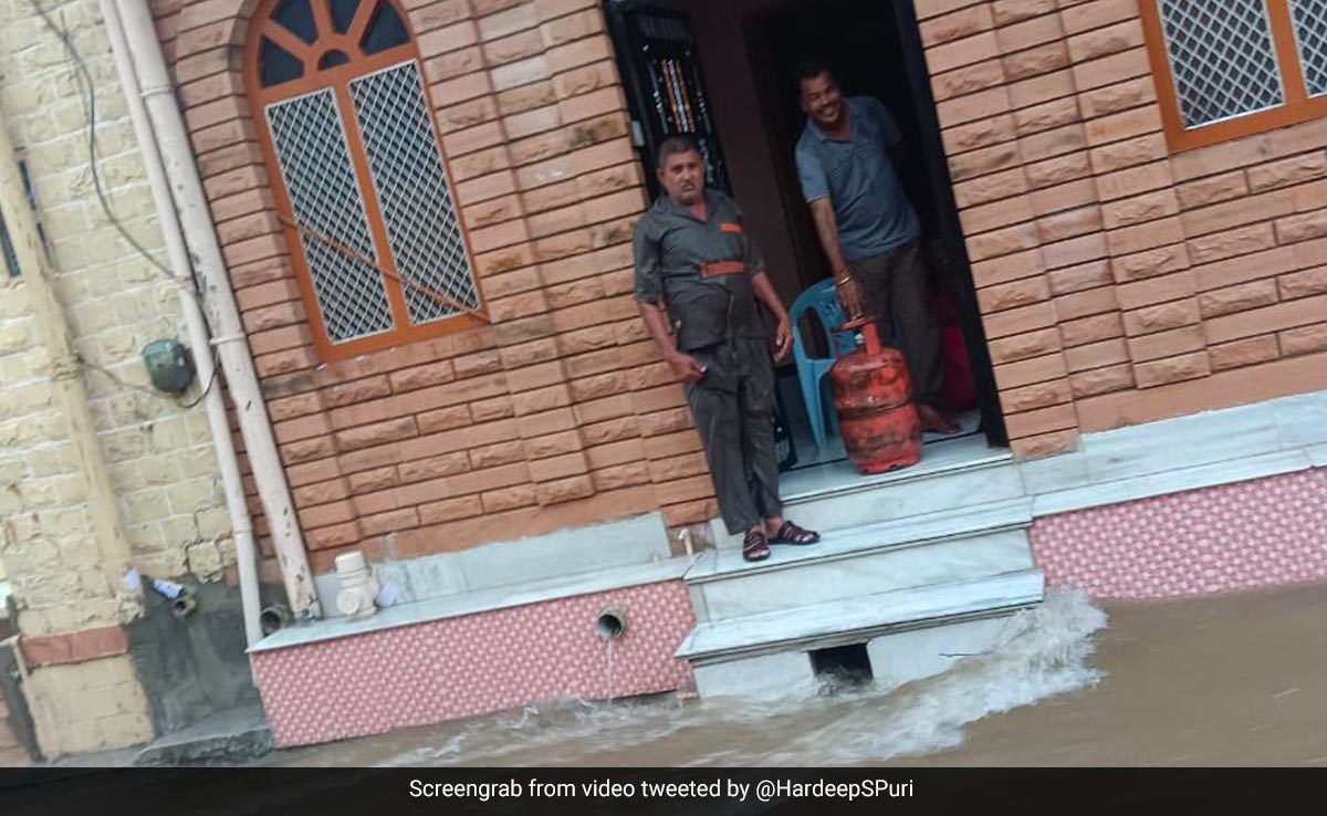 Watch: In Rain-Hit Rajasthan, Man Continues To Deliver Gas Cylinder, Impresses Internet