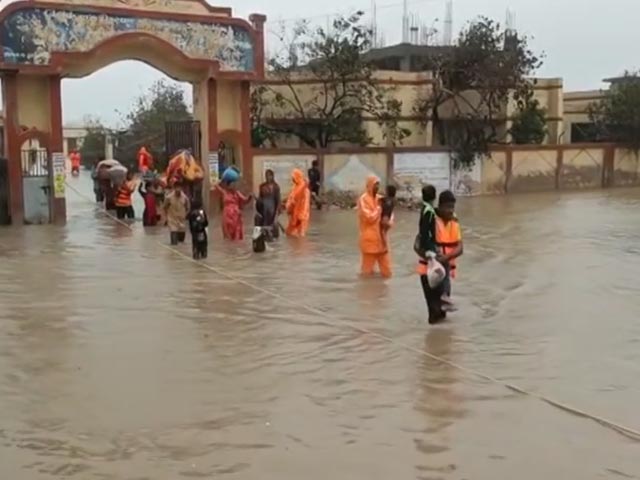 Watch: Cyclone Rescue Team Carries Out Infant In Empty Cement Bag In Gujarat