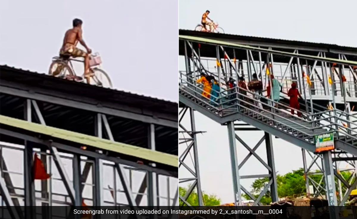 फुट ओवरब्रिज की छत पर साइकिल दौड़ाता नजर आया शख्स, लोग बोले- ये तो असली हैवी ड्राइवर निकला