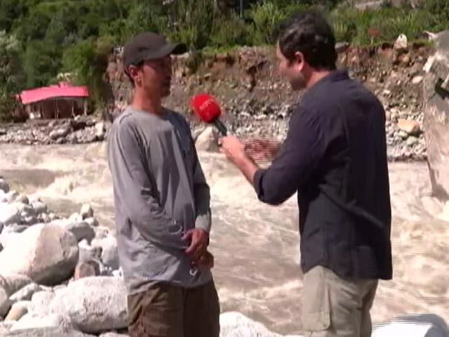 Swollen Himachal River Overturns Mammoth Rock, Traps Man