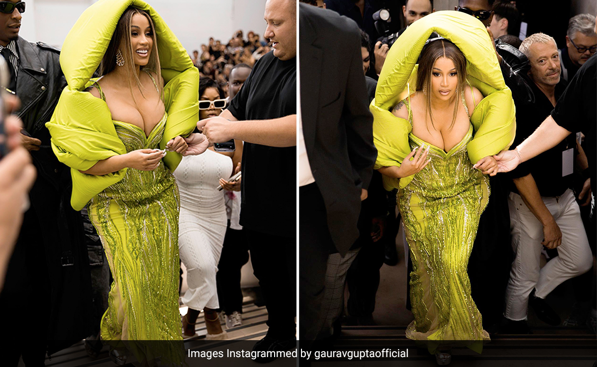 Cardi B Arrives In A Dramatic Green Hooded Gown For Gaurav Gupta's Paris Couture Week Show