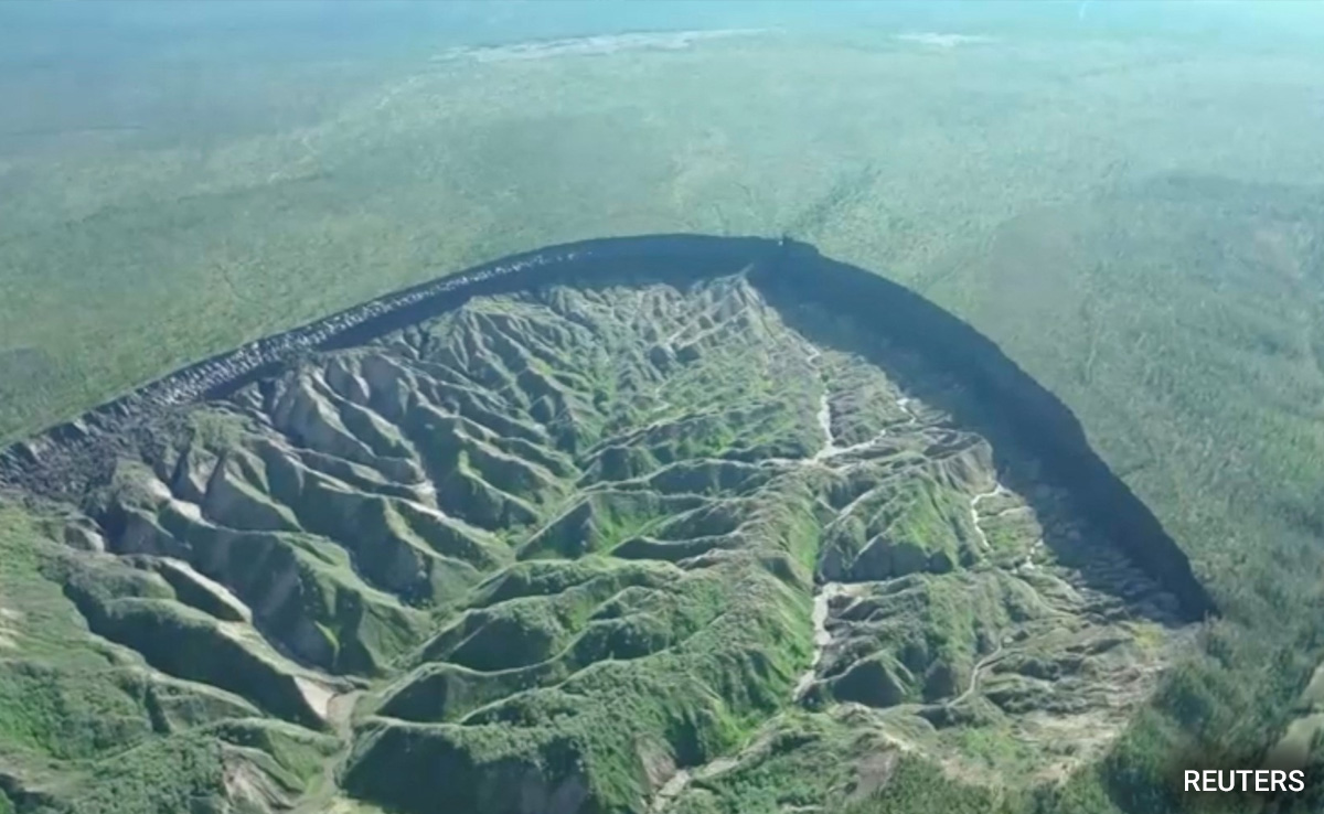"Gateway To Underworld": World's Biggest Frozen Crater In Russia Thaws