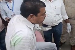 Madhya Pradesh Official Swallows Bribe Money On Spotting Cops Madhya Pradesh Official Swallows Bribe Money On Spotting Cops