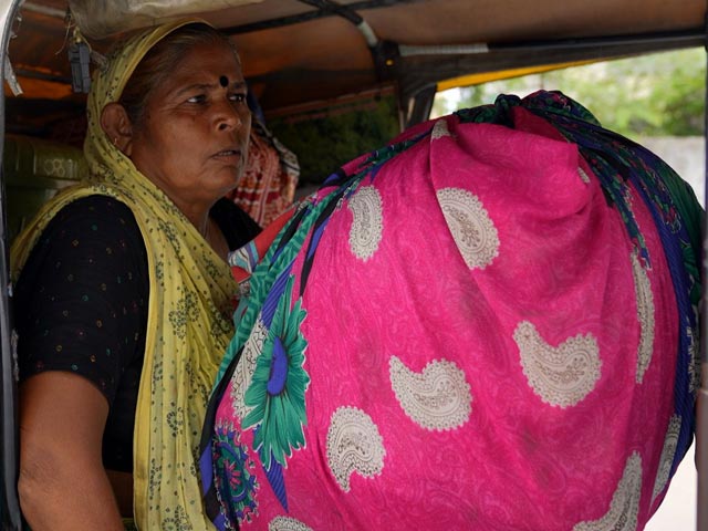 Radha Ben, The Neighbourhood Clothes' Recycler