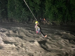 On Camera, Dramatic Late-Night Rescue Across Raging River On Camera, Dramatic Late-Night Rescue Across Raging River