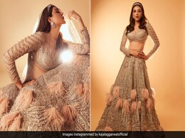 Kajal Aggarwal In A Feathered Gold Embellished <i>Lehenga</i> Is A Far Throw From Basic Kajal Aggarwal In A Feathered Gold Embellished <i>Lehenga</i> Is A Far Throw From Basic