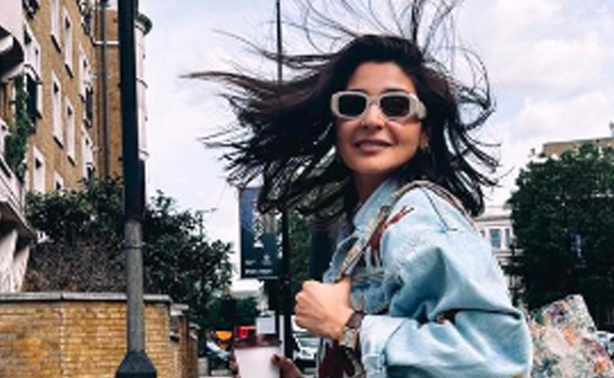 Anushka Sharma, Strolling Through London With Coffee In Hand. Bonus - Of Course Virat Kohli