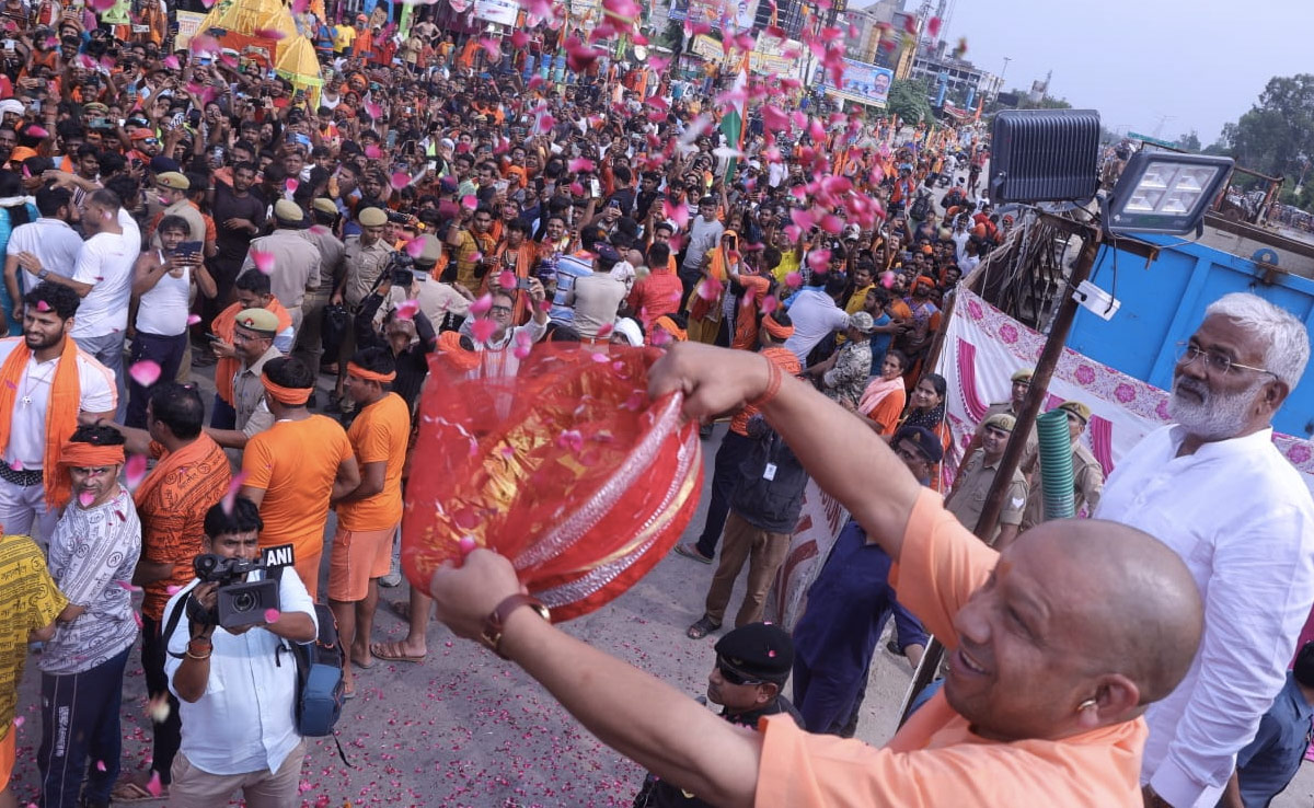 Watch: Yogi Adityanath Showers Flowers On Kanwariyas On Delhi-Meerut Highway