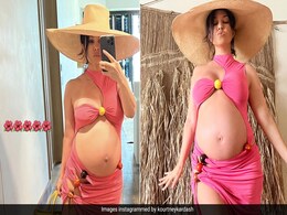 It's "Aloha" From Kourtney Kardashian And Her Baby Bump In A Pink Cutout Mini Dress And Straw Hat It's "Aloha" From Kourtney Kardashian And Her Baby Bump In A Pink Cutout Mini Dress And Straw Hat