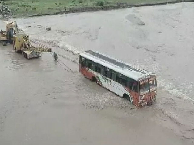 Passenger Bus Stuck As River Overflows In UP