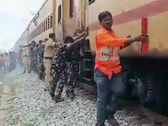 Video: Cops, Railways Staff Push Train Coach Away From Fire
