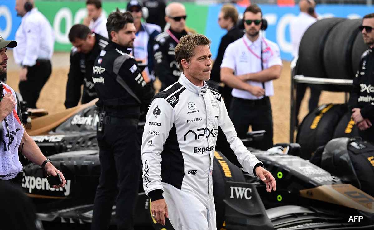 Brad Pitt At British Grand Prix: "I'm Gonna Be Here Until They Kick Me Out"