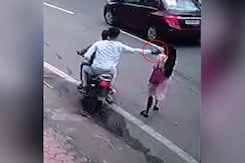 On Camera: Woman Falls Face-First On Road As Bikers Snatch Her Phone On Camera: Woman Falls Face-First On Road As Bikers Snatch Her Phone