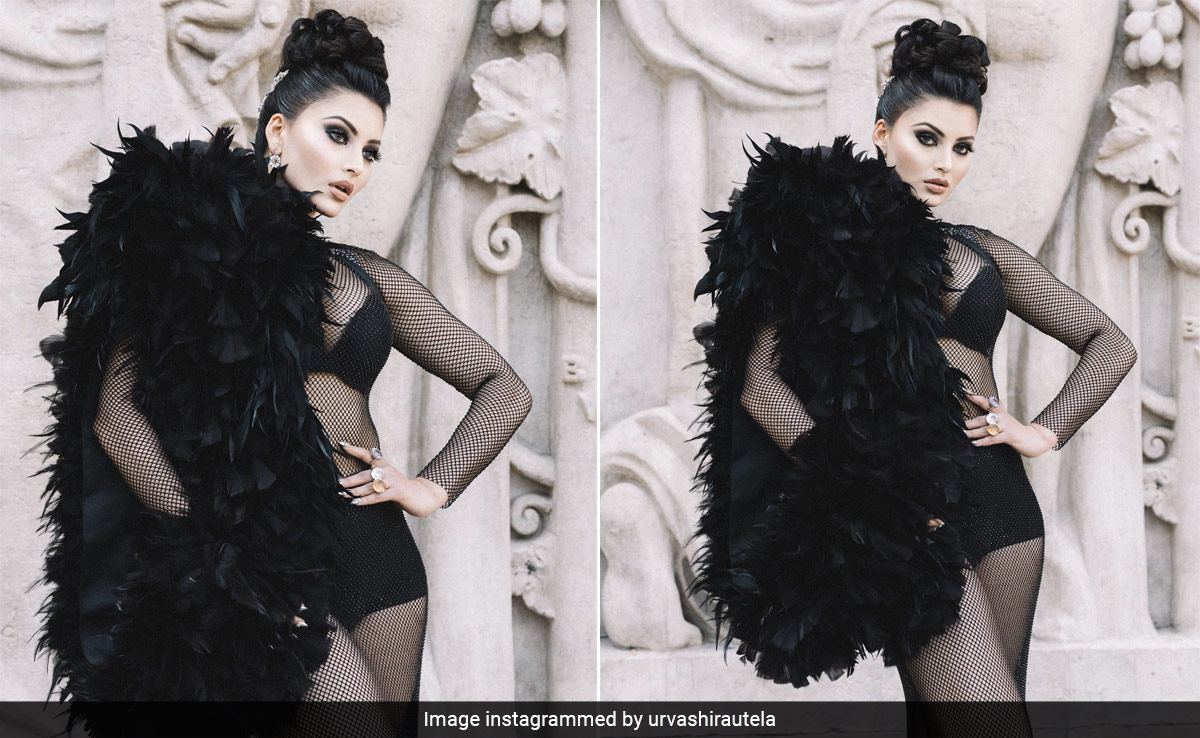 Urvashi Rautela Flutters Away To Fashion Town In A Bold Black Mesh Look For Paris Haute Couture Week