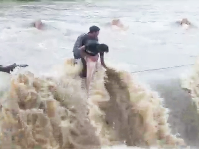 Two Men, Trying To Avoid Rain, Get Stuck On Waterlogged Bridge In Rajasthan