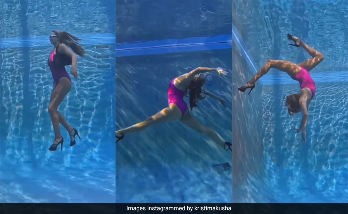 In A Pink Swimsuit And Heels, This "Aqua Barbie" Can Stylishly Bust A Move Underwater