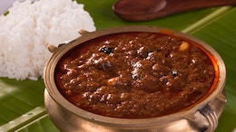 Race Kuzhambu - A Traditional South Indian Curry Made With A Mix Of Dals And Baingan