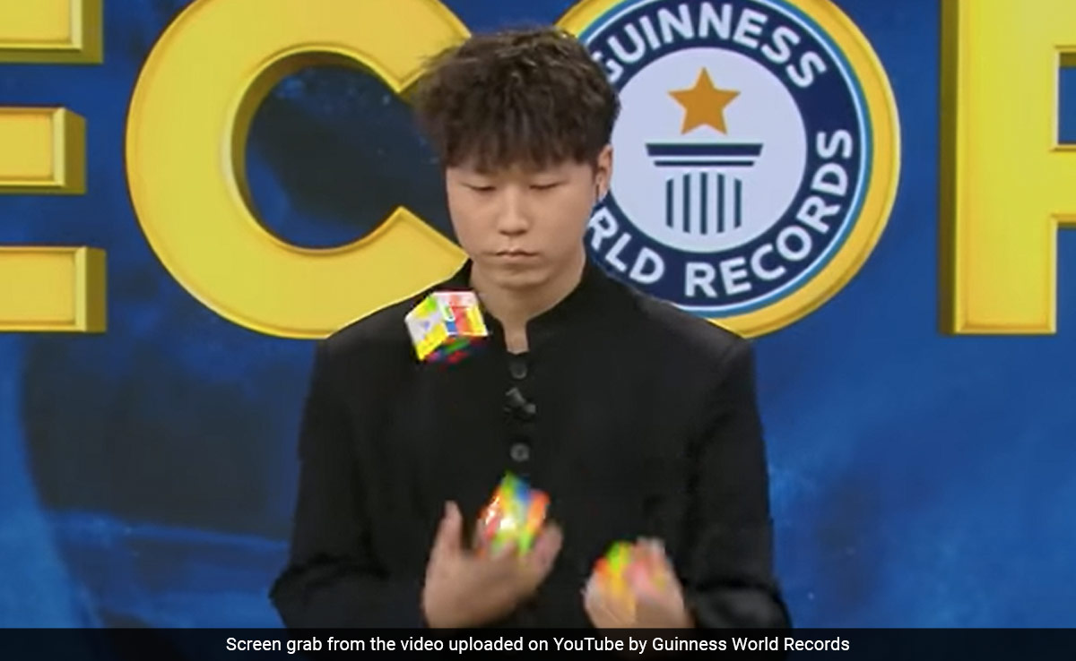 Video: Chinese Man Solves Three Rubik's Cubes In Three Minutes While Juggling Them