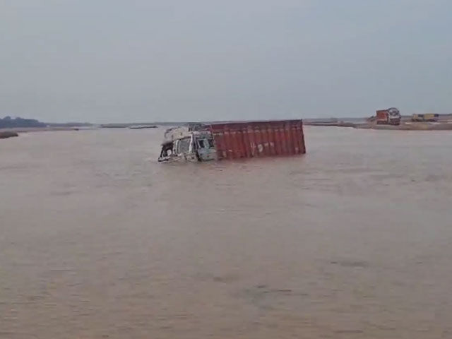 Video: One By One, Submerged Trucks In Bihar Pulled Out From River